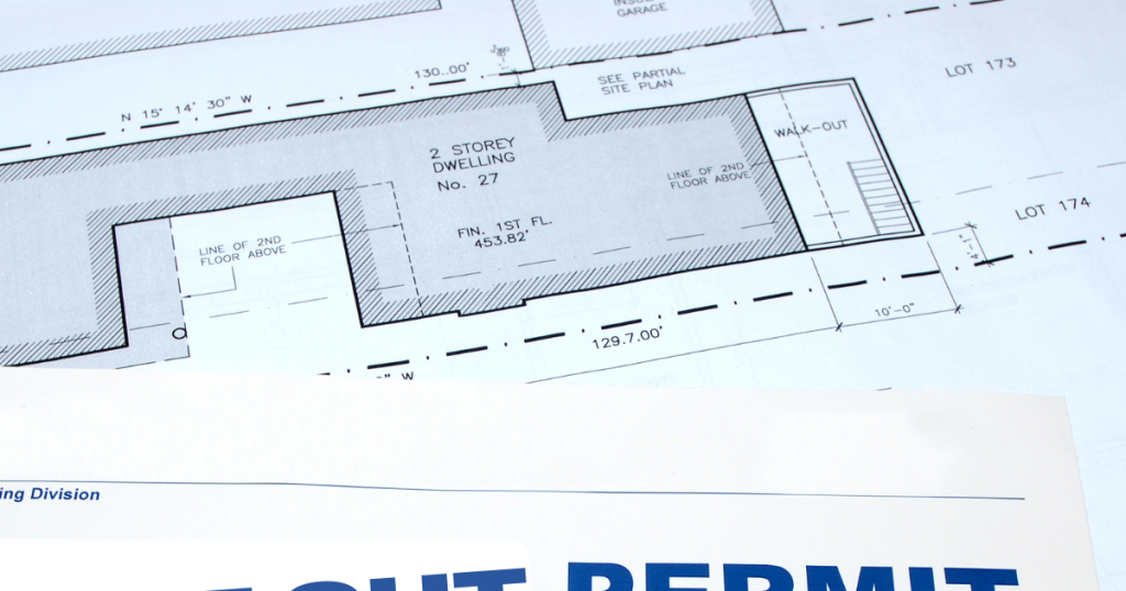 Contractors reading UK permit for a fit-out 